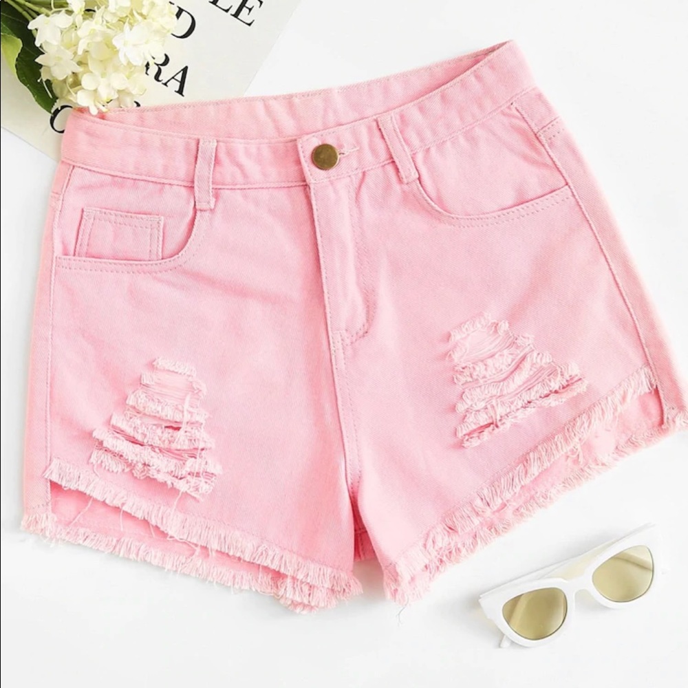 Pink denim shorts. Never worn.